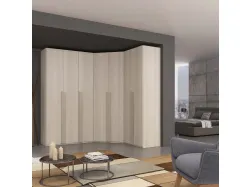 Corner wardrobe with swing door and vertical handles customizable finishes.
