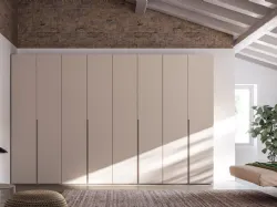 Swing door wardrobe with Gola 1200 door. Cotton interior, doors and handles in Tortora melamine.