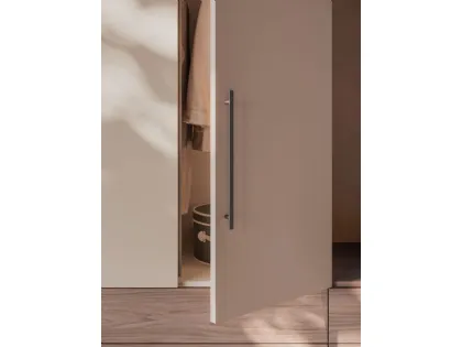 Swing door wardrobe with Smooth door, Cotton interior, drawers and open element in textured Walnut.