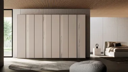 Wardrobe with doors in Tortora melamine with vertical marble melamine band.