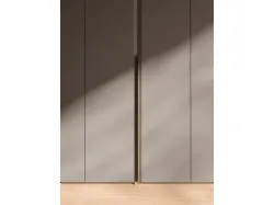 Hinged wardrobe with Soap-bar door and dedicated handle 400x260cm.