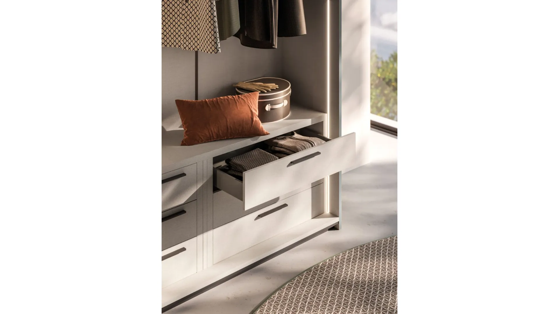 Sliding wardrobe with cotton interior, doors and recessed handle in matte lead lacquer.