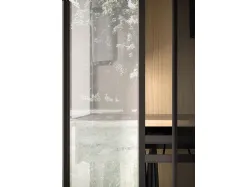 Skeleton wardrobe with glass doors, with internal passing sides and external sides in glass.