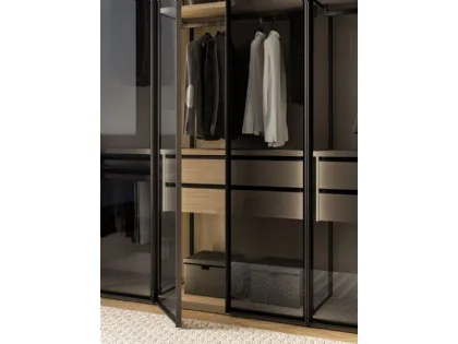 Skeleton wardrobe with glass doors, with internal passing sides and external sides in glass.