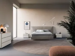 Double bedroom complete with night group in matte lacquered white with Palladium metal profiles.