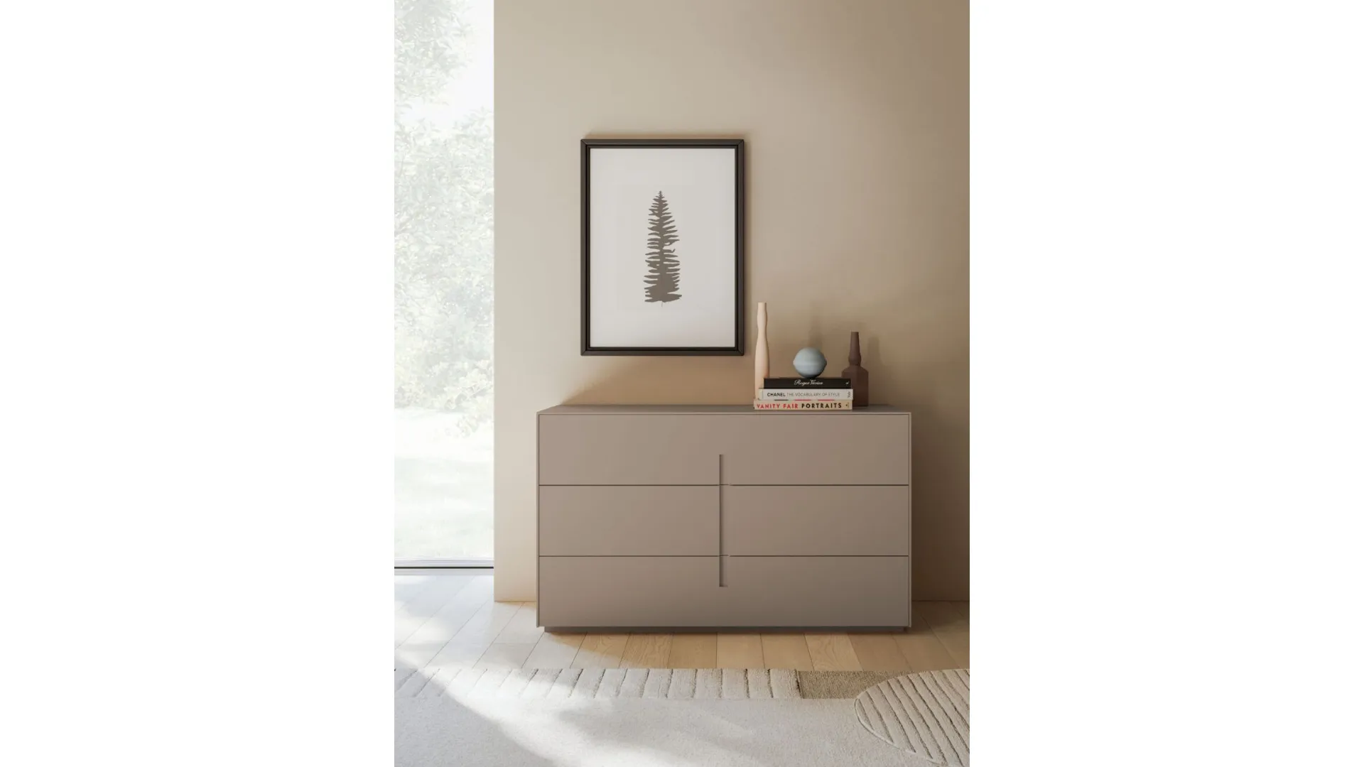 Aura double bed with matte lacquered bedframe and burnished metal feet.
