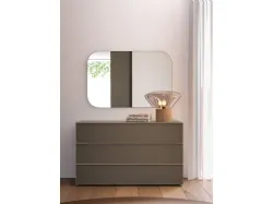 Modern double bedroom with upholstered fabric bed and night group in matte lacquered Earth color.