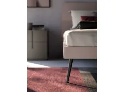 Modern double room with designer bed and customizable night group in finishes.