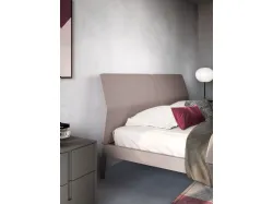 Modern double room with designer bed and customizable night group in finishes.