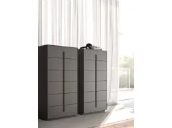 Modern double bedroom with designer bed and customizable night group in finishes.