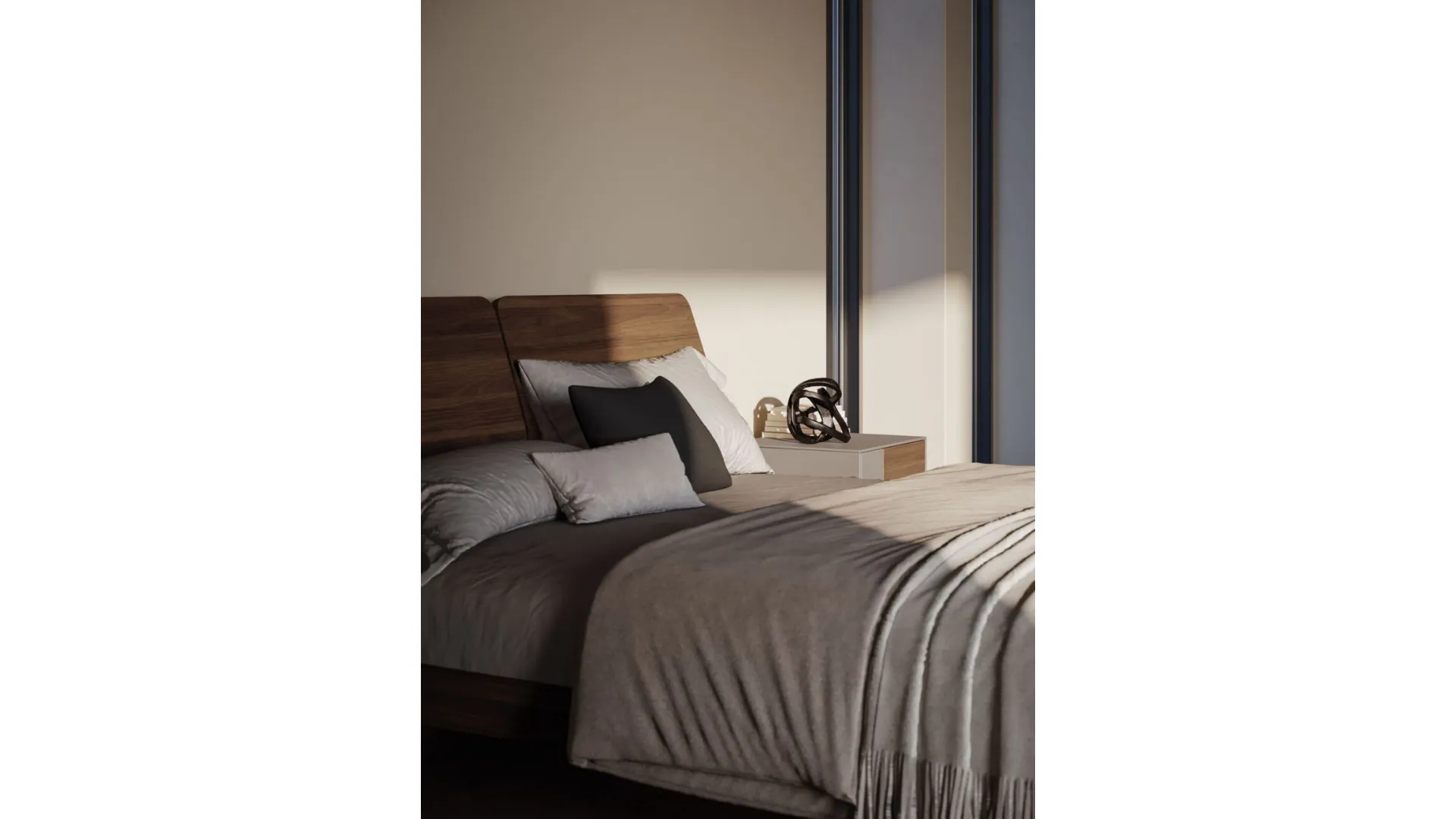 Double room complete with a bed with a textured bed frame and a dark metal foot.