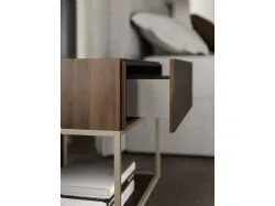 Double bed Fiocco with fabric bedframe and night group in textured Cotto