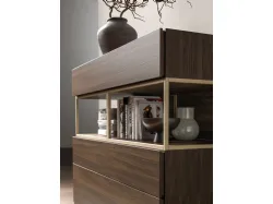 Double bedroom with bed frame in fabric and night group in textured terracotta.