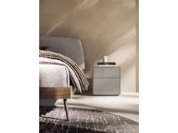 Double bedroom with Gaia bed and night group in matte lacquered Titanium.