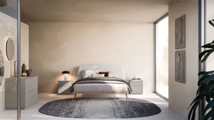 Double room with bed Gaia and night group in matte lacquered Titanium.