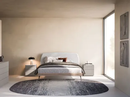 Double room with bed Gaia and night group in matte lacquered Titanium.