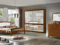 Double bedroom complete with classic style in high-quality wood craftsmanship.