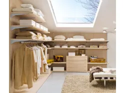 Custom-made corner walk-in closet in the attic.