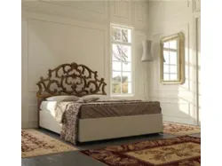 Double wooden beds in a classic style of excellent craftsmanship.