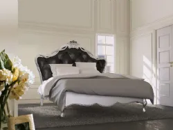 Double wooden beds in classic style of excellent craftsmanship.