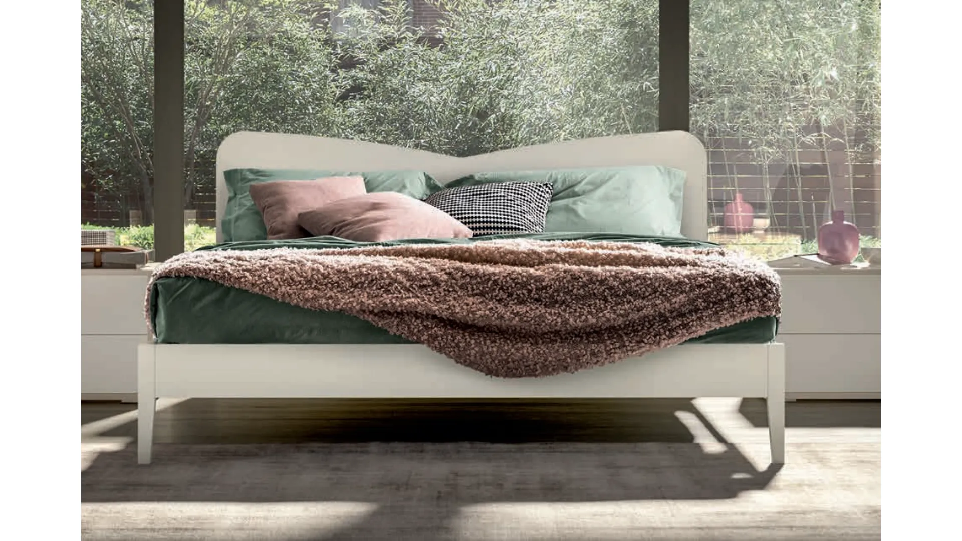 Double bed with shaped headboard, quality materials, and customizable finishes 160x195