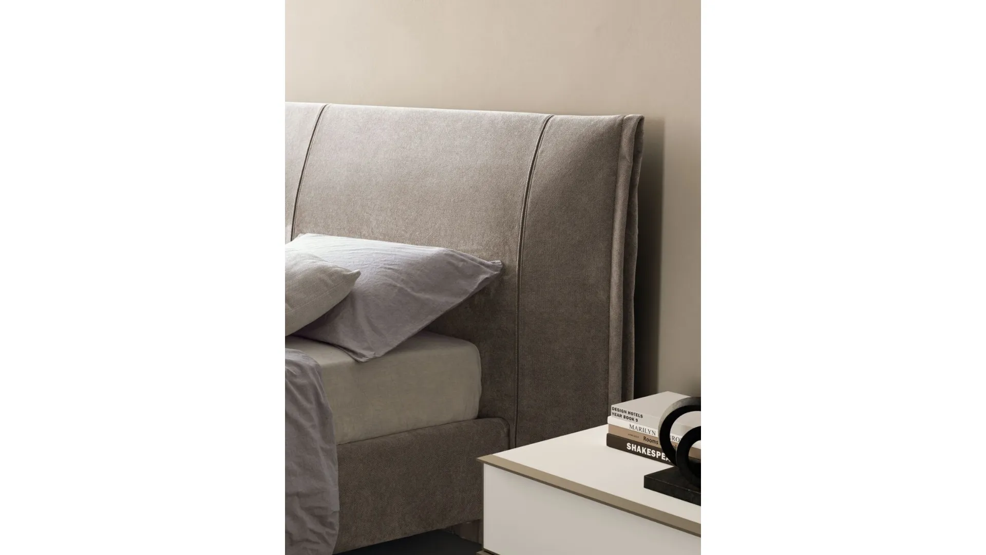 Double bed model Lavinia, upholstered with Sigma bed frame in fabric.