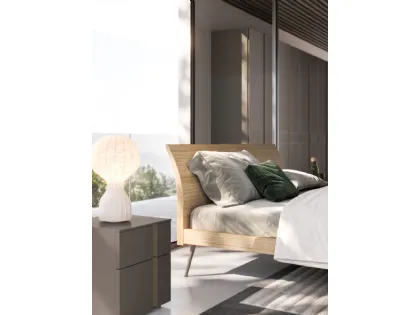 Double bed model loge in oak textured material with Metal 1 Palladium lacquered metal foot.