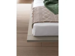Double bed model Ofelia with reclining upholstered headboard in fabric.