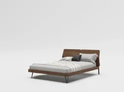 Queen-size bed model Ofelia with matte lacquered bed frame and bronze metal foot.