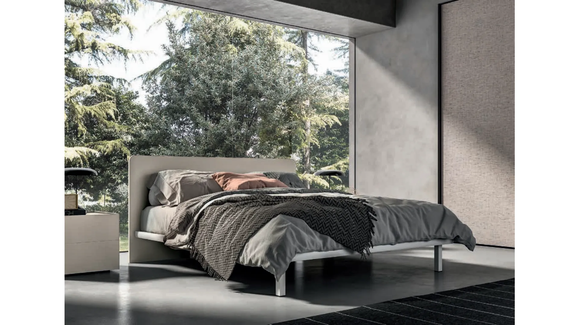 Double bed with rounded headboard, high-quality materials and customizable finishes.