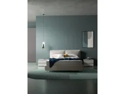 Double bed model Sally with a headboard with two cushioned panels in fabric 160x200.