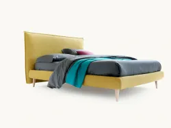 Double bed with padded headboard, customization of finishes.