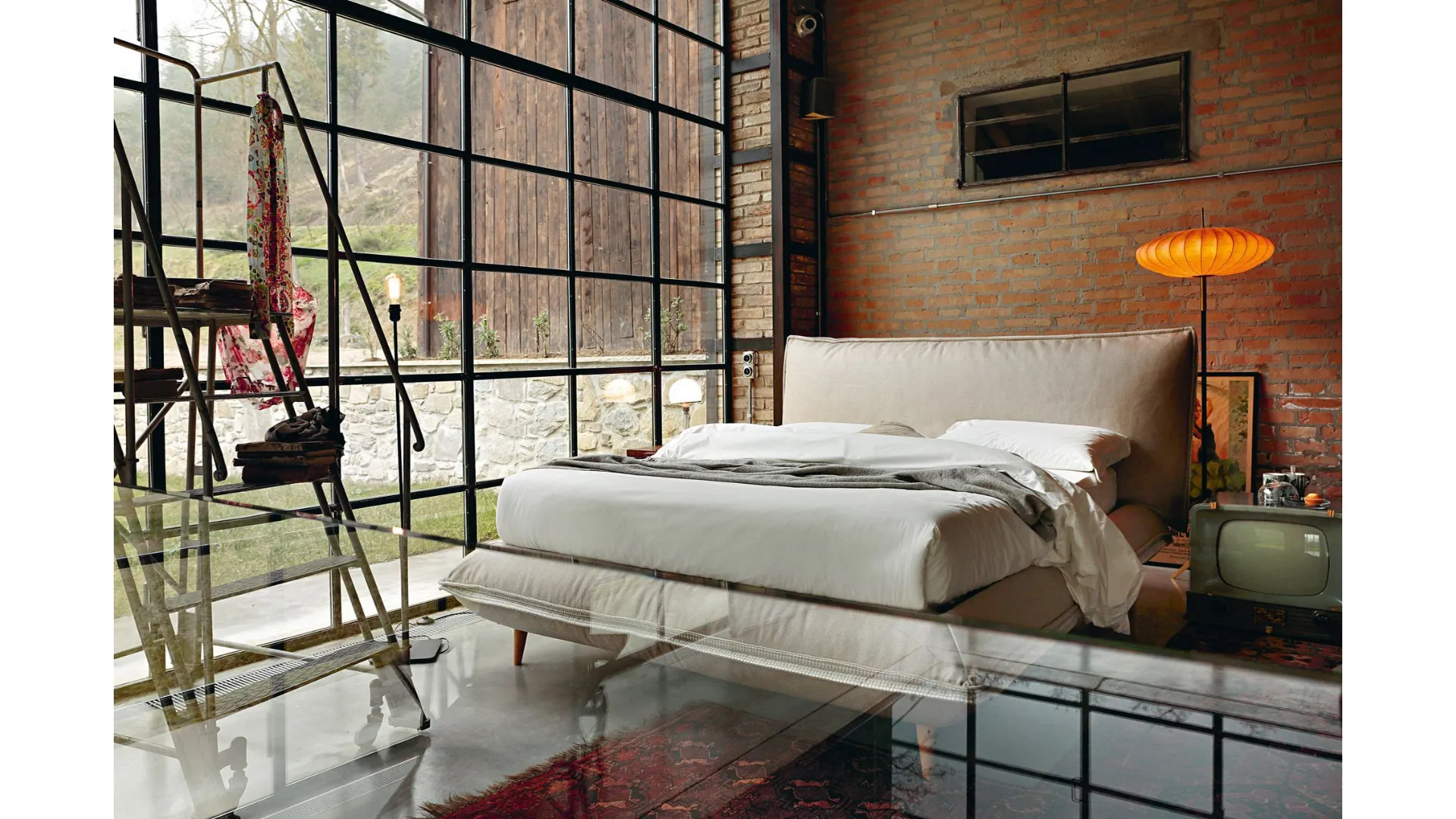 King-size storage bed available in various materials and finishes by Noctis Davis.