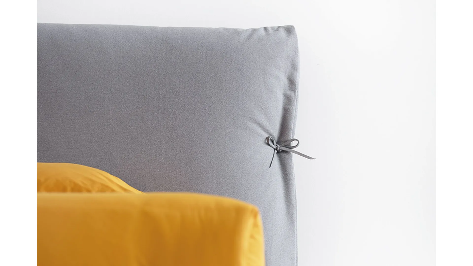 Bed Noctis Eden Advance with soft headboard in Fiocchi or Alamari version