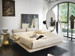 Double flamingo bed with invisible feet, floating effect.