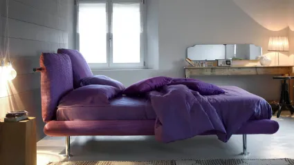 Double bed Noah with soft pillows on the headboard.