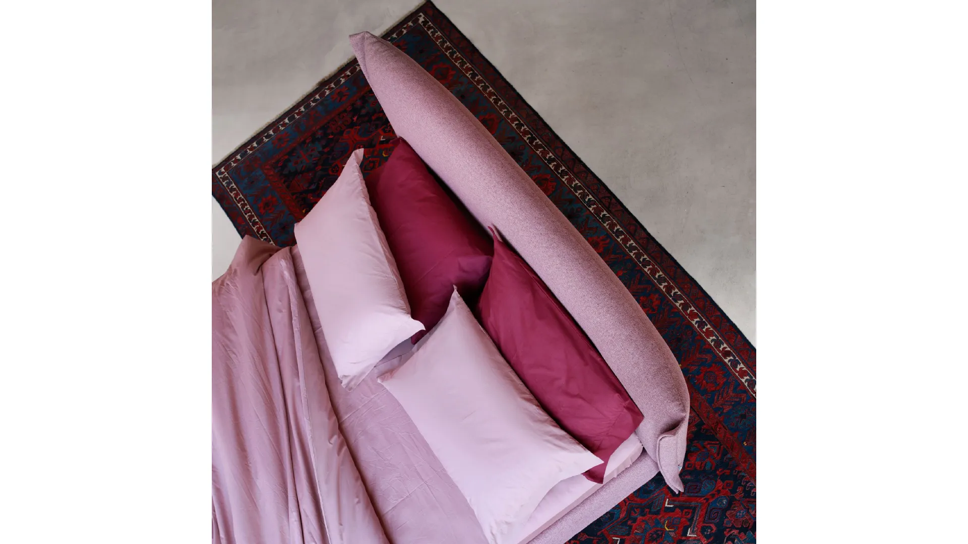 King size bed with a curved and embracing padded headboard in Osaka style.