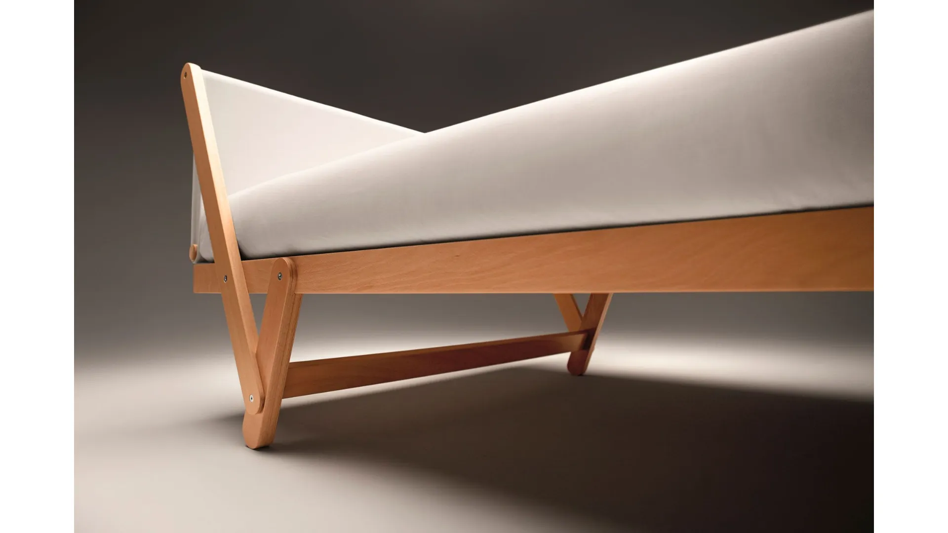Noctis Tolò double bed designed by architect Vittorio Prato, with fabric headboard.