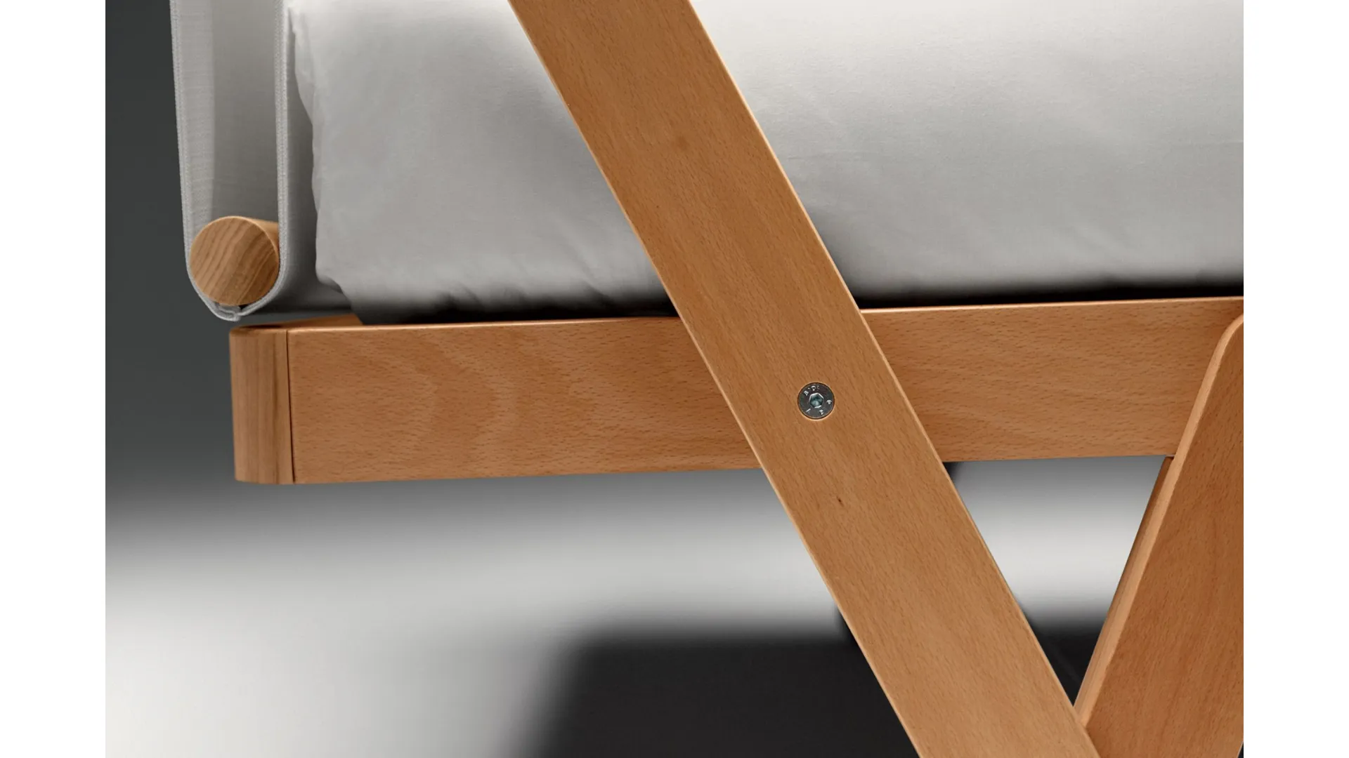 I took the double bed designed by architect Vittorio Prato, with a fabric headboard.