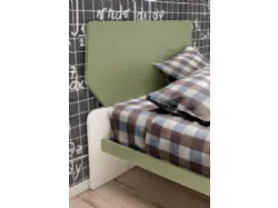 Single bed with headboard composed of two shaped panels, sturdy and stable structure.
