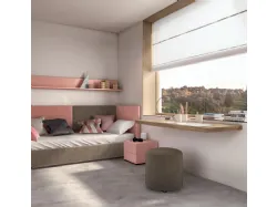 Functional and modern teenage bedroom complete with a wardrobe and floating desk.