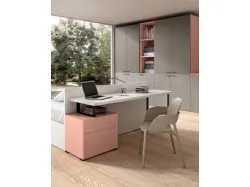 Modern teenage room with a desk that doubles as a headboard to optimize space.