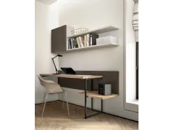 Modern designed bedroom with desk and peninsula cabinet ideal for integrating TV.