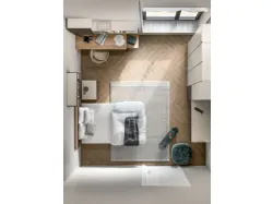 Modern design bedroom with desk and peninsula mobile ideal for integrating TV.