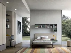 Modern bedroom for teenagers with integrated desk in the wardrobe.