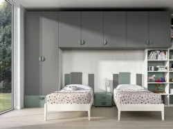Modern children's bedroom with a bridge wardrobe and two-tone design bookcase.