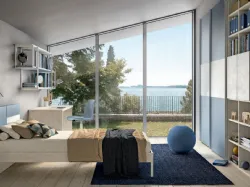 Modern, functional and stylish children's bedroom, with a study area.