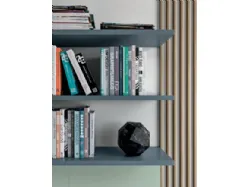 Refined and modern bedroom, complete with wardrobe and study area.