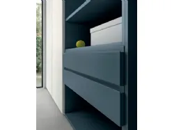 Refined and modern bedroom, complete with wardrobe and study area.