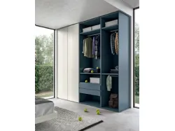 Refined and modern bedroom, complete with wardrobe and study area.